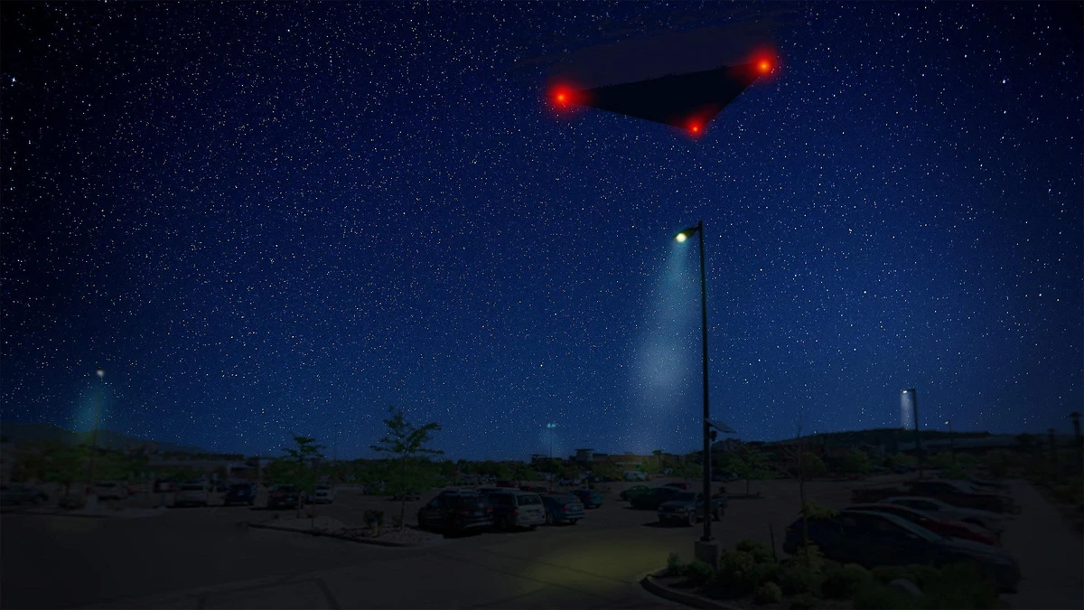 FBI digital rendering FBI-UAP-D031 showing a large dark triangle with three red corner lights above a car park at night in Colorado Springs, October 2023