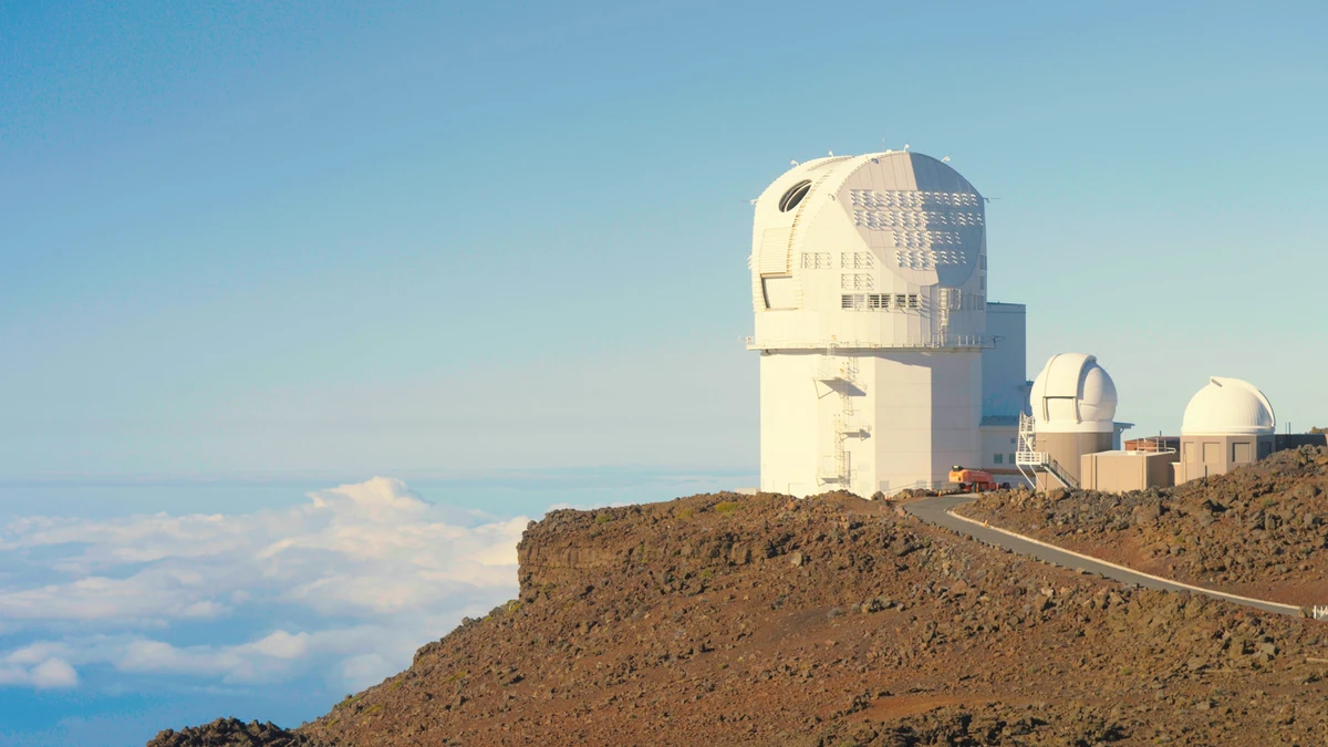 The NSF Daniel K. Inouye Solar Telescope building on the summit of Haleakala in Maui, Hawaii, under a clear blue sky