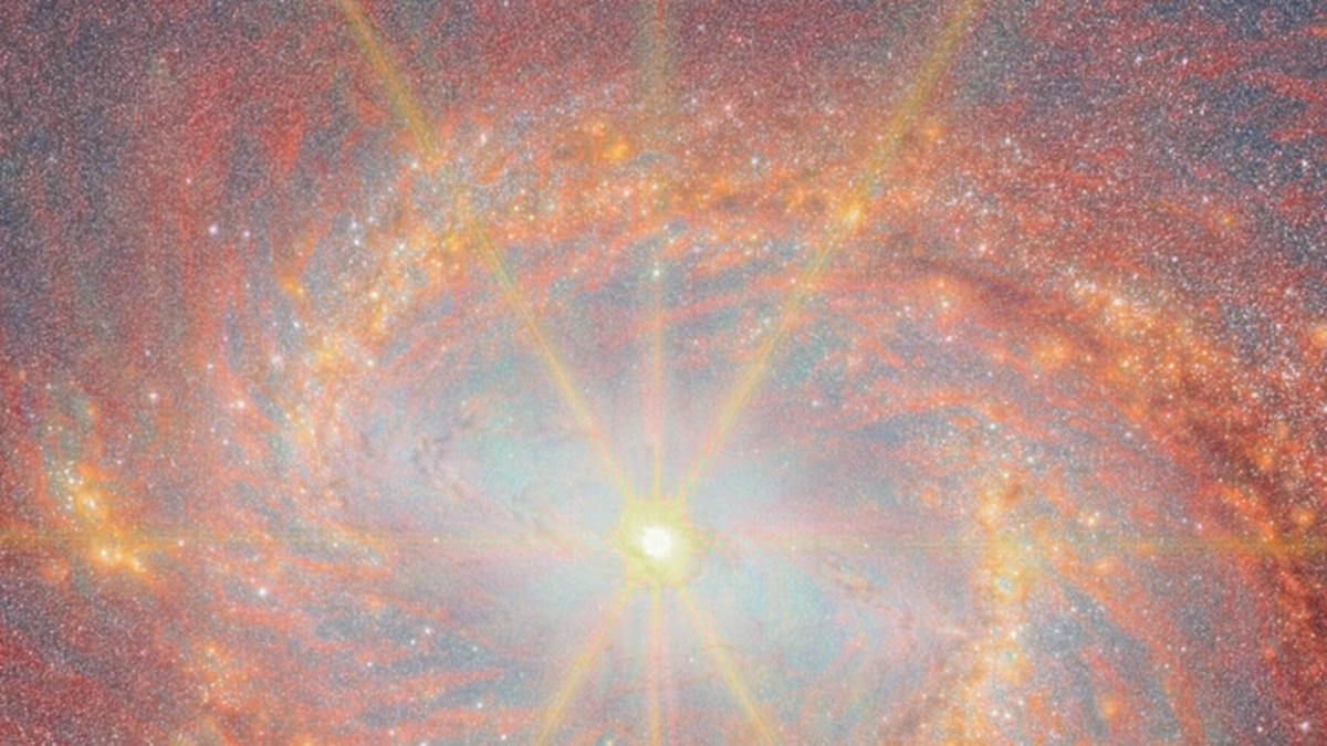 Close-up of M77's nucleus and starburst ring in James Webb Space Telescope NIRCam infrared data, showing the blazing active galactic nucleus and surrounding ring of star formation