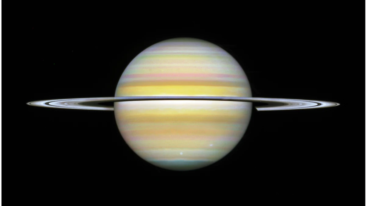 Hubble Space Telescope image of Saturn from 29 August 2025 showing the full planet with pale yellow and orange cloud bands and its rings seen nearly edge-on