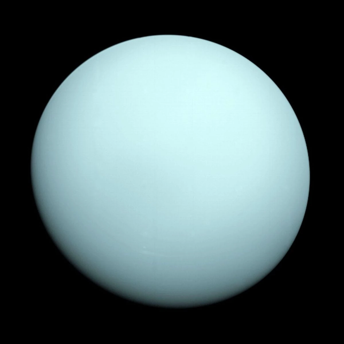 Uranus true colour image from Voyager 2 spacecraft showing pale blue-green ice giant planet in 1986