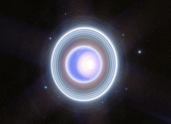Uranus planet with rings and moons photographed by James Webb Space Telescope NIRCam showing bright polar cap, eleven rings and several moons