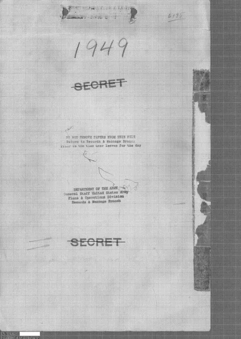 A file folder with a declassification sticker.