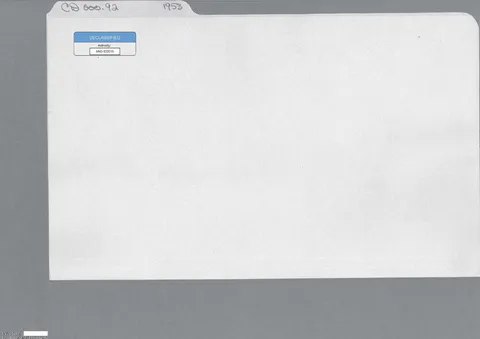 A file folder with a declassification sticker and tab.