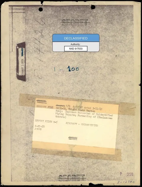 A file cover with a declassification sticker.