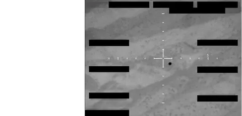 Redacted sensor image with a crosshair targeting an object.