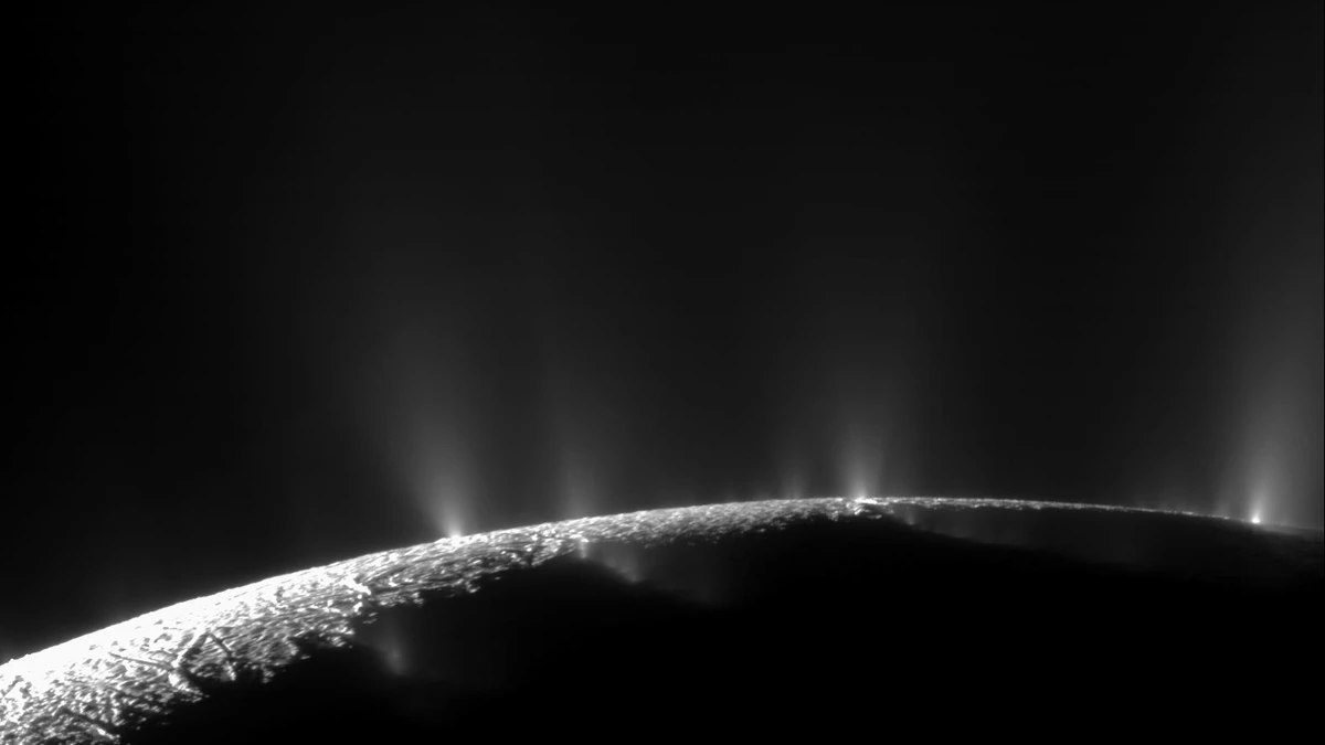 Jets of water ice erupting from many points along the tiger stripe fractures near the south pole of Enceladus, photographed by Cassini