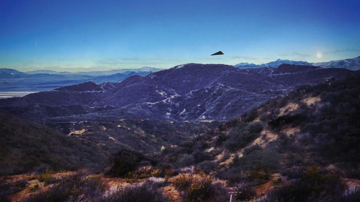 Composite image from page 6 of FBI-UAP-D043: a flat black triangle added above a scrub-covered ridge in a landscape photograph, with distant ranges under a blue sky